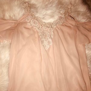 Flowy pink blouse from The Buckle